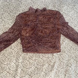 Mistress Rocks mesh long sleeved cropped turtleneck